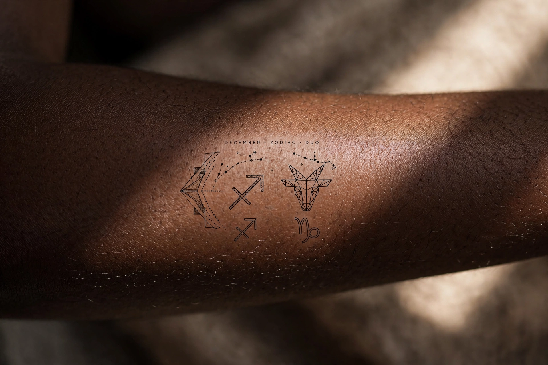 Sagittarius and Capricorn zodiac birth month tattoo