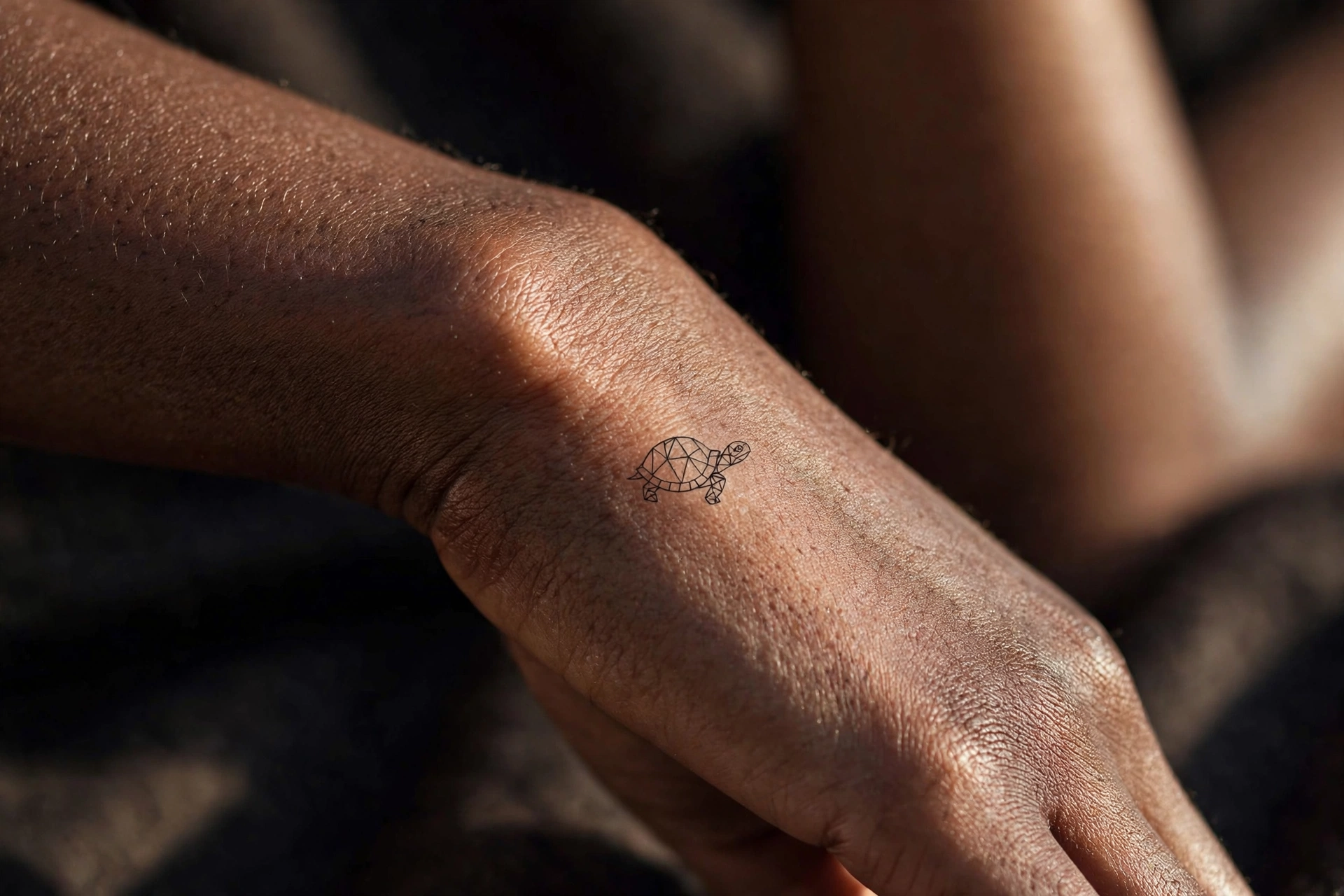 Tiny turtle first tattoo idea for women on the ankle