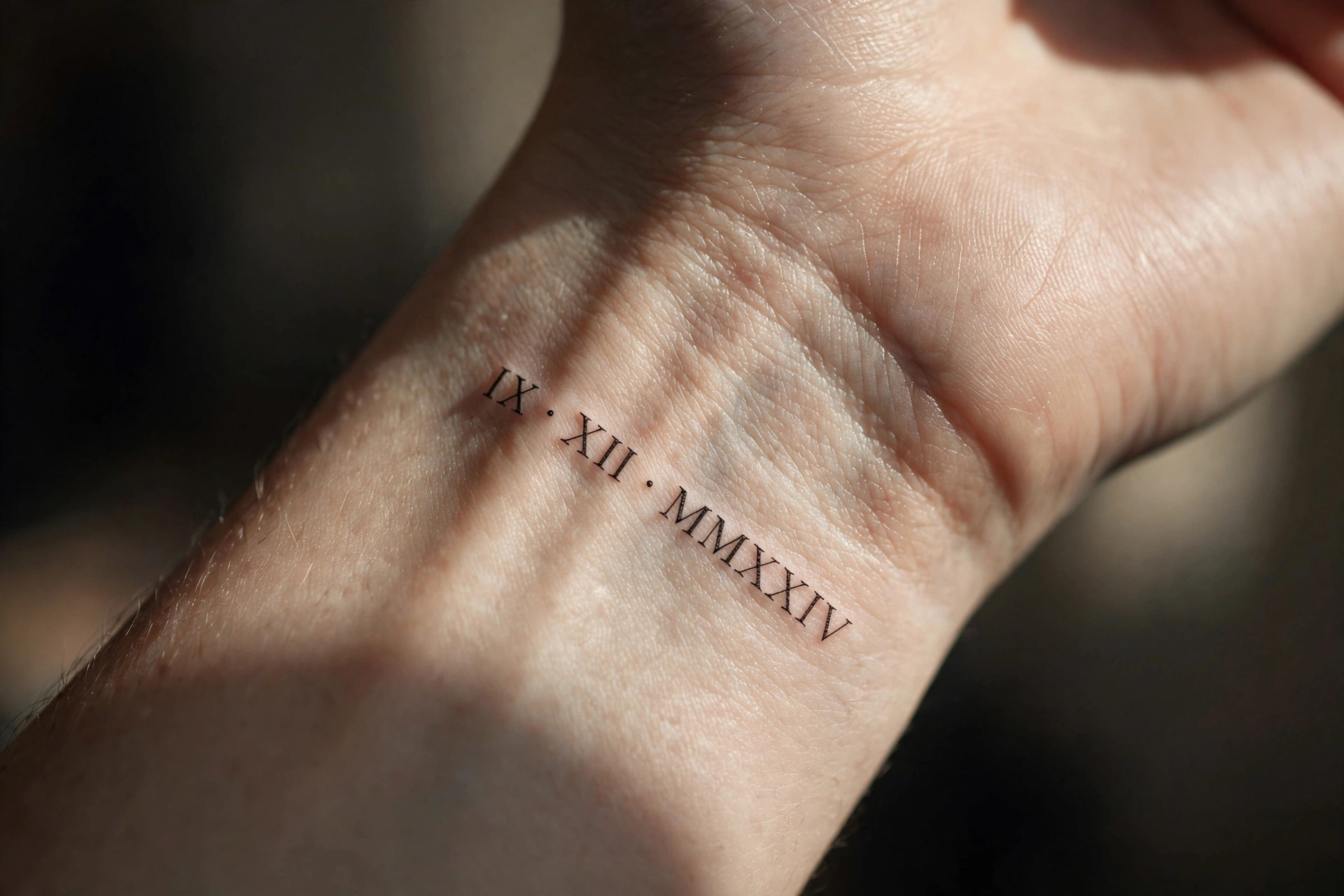Roman numerals date tattoo along the inner wrist