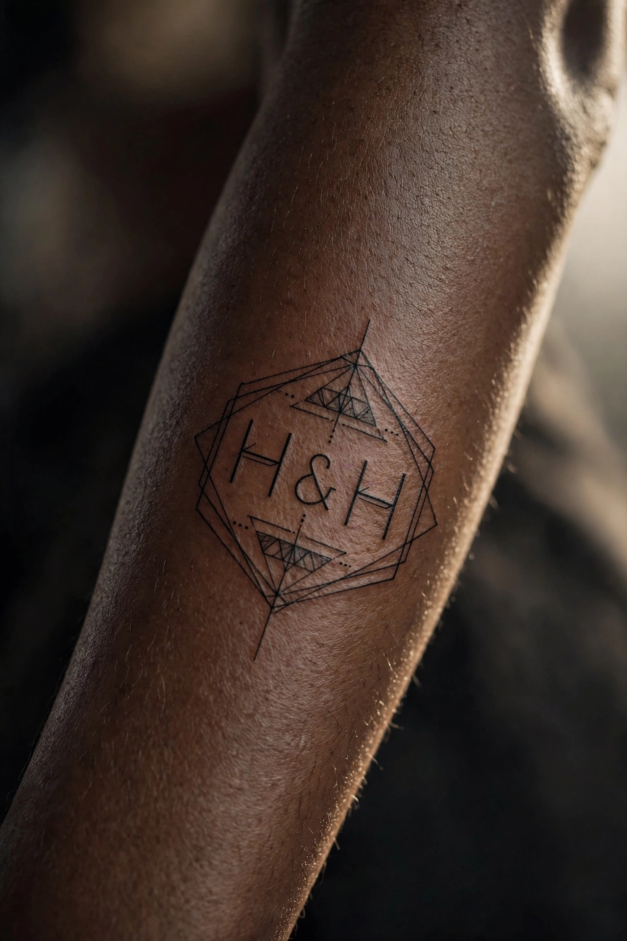 His and her initials matching couple tattoo in script