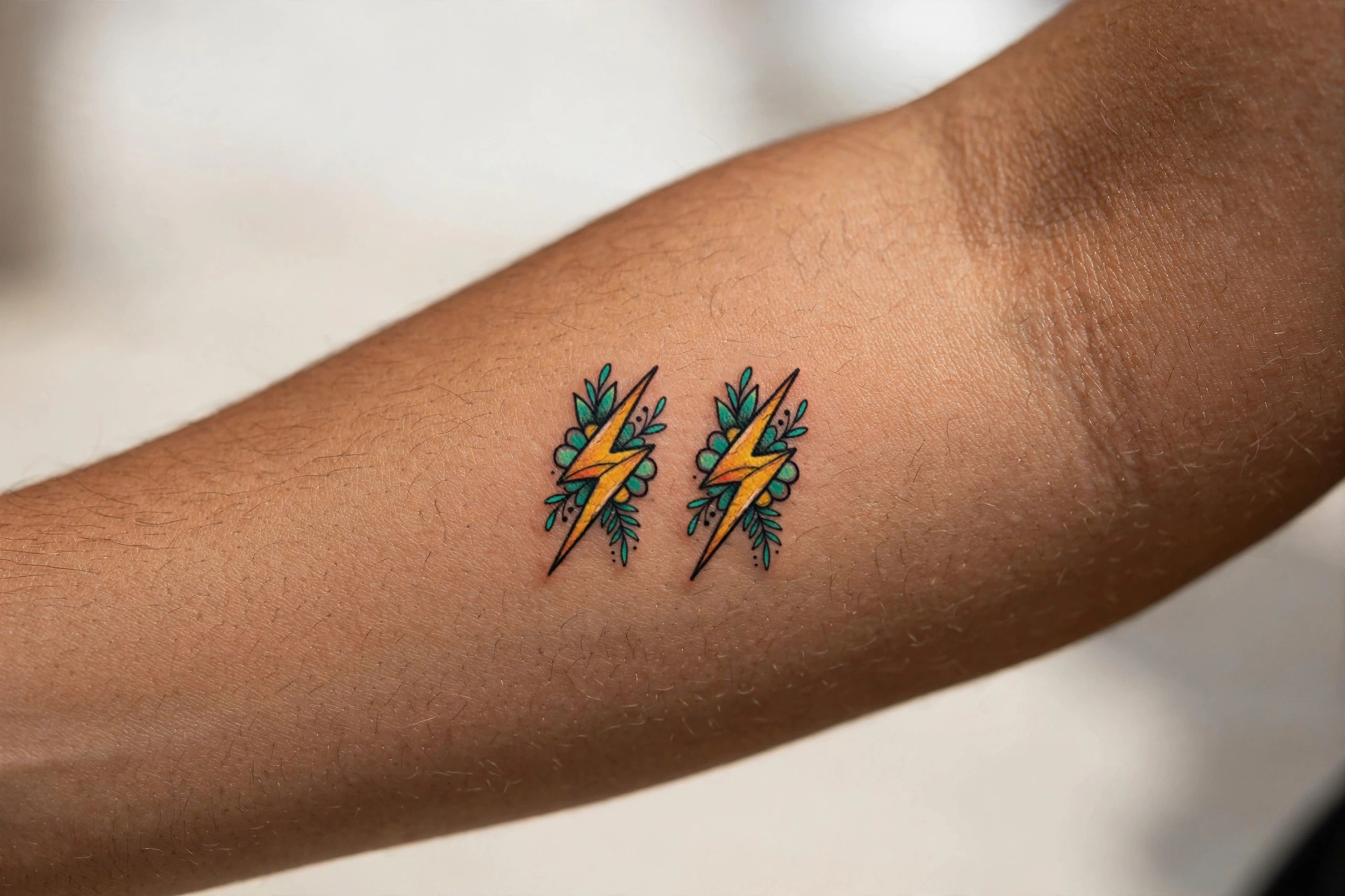 Matching tiny lightning bolt tattoos for couples