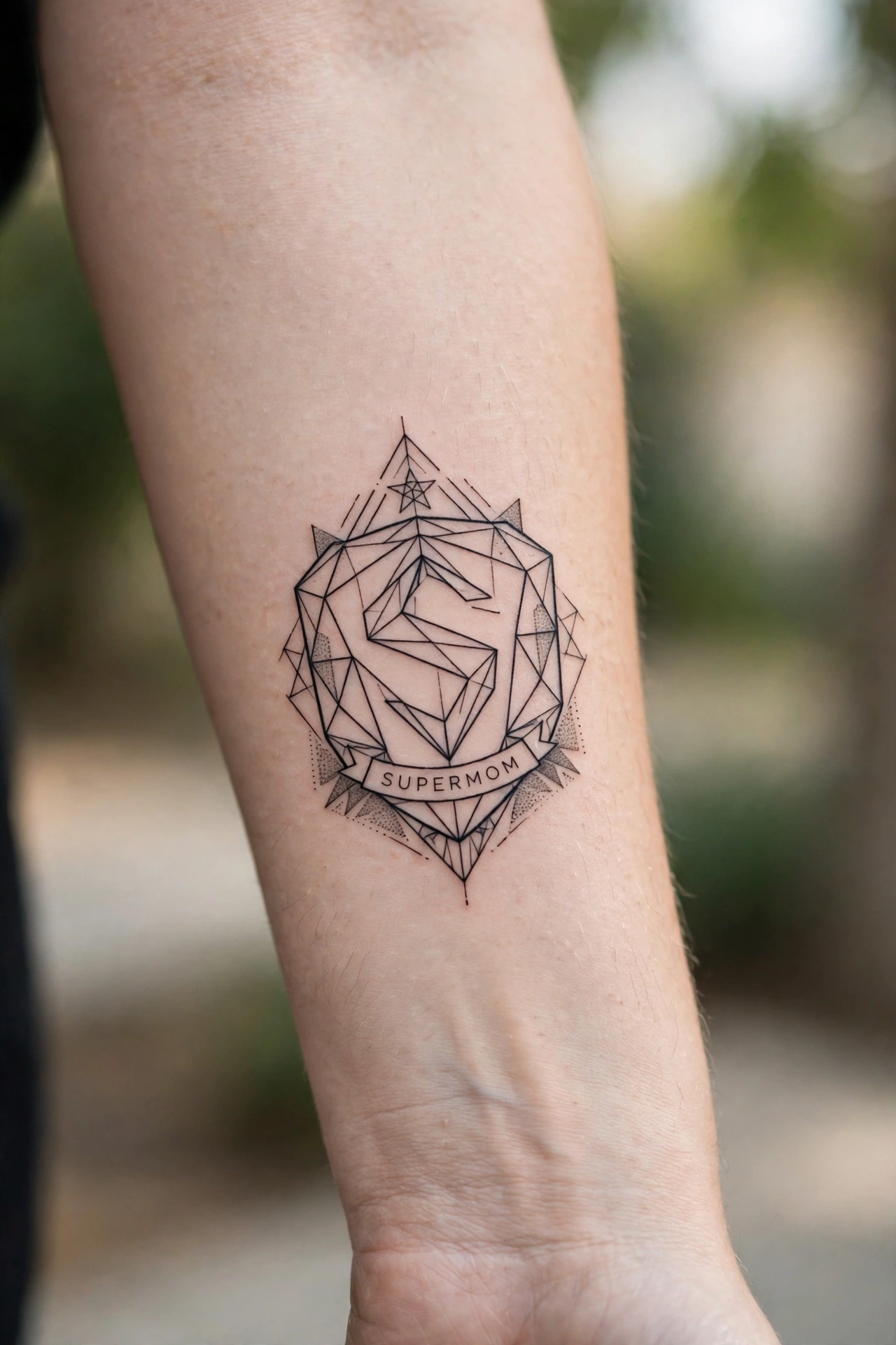 Supermom comic-style emblem tattoo, playful tribute