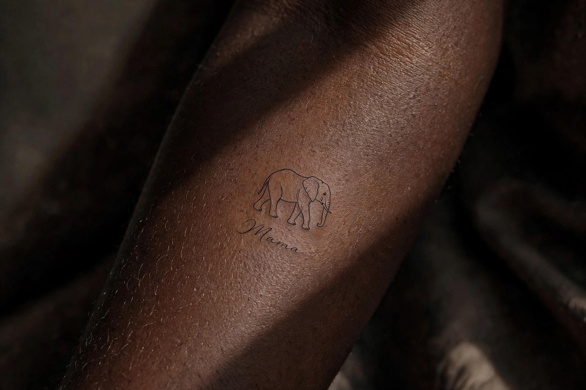 Mother elephant tattoo tribute for mom