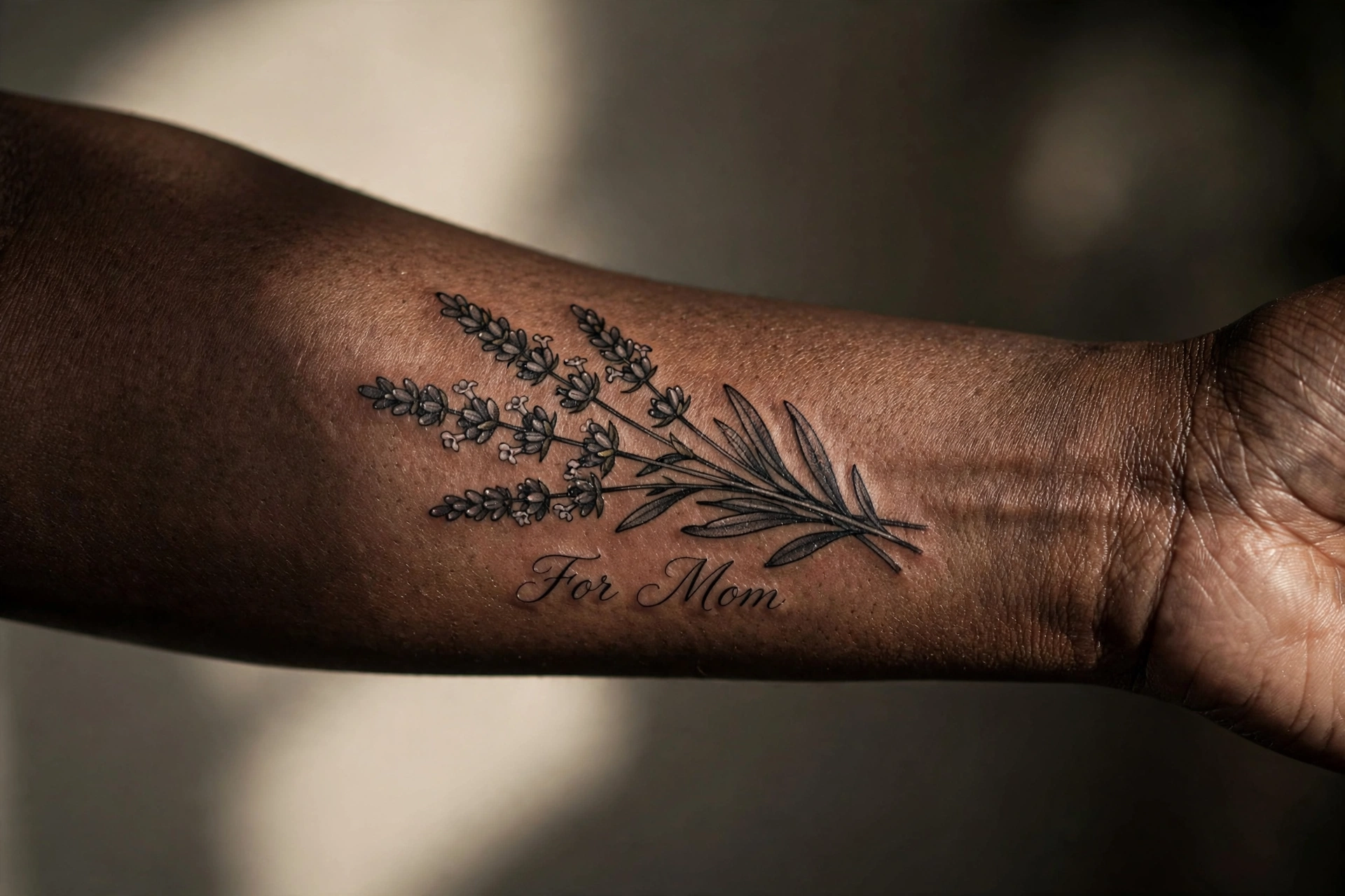 Lavender sprig tattoo for mom, devotion symbolism