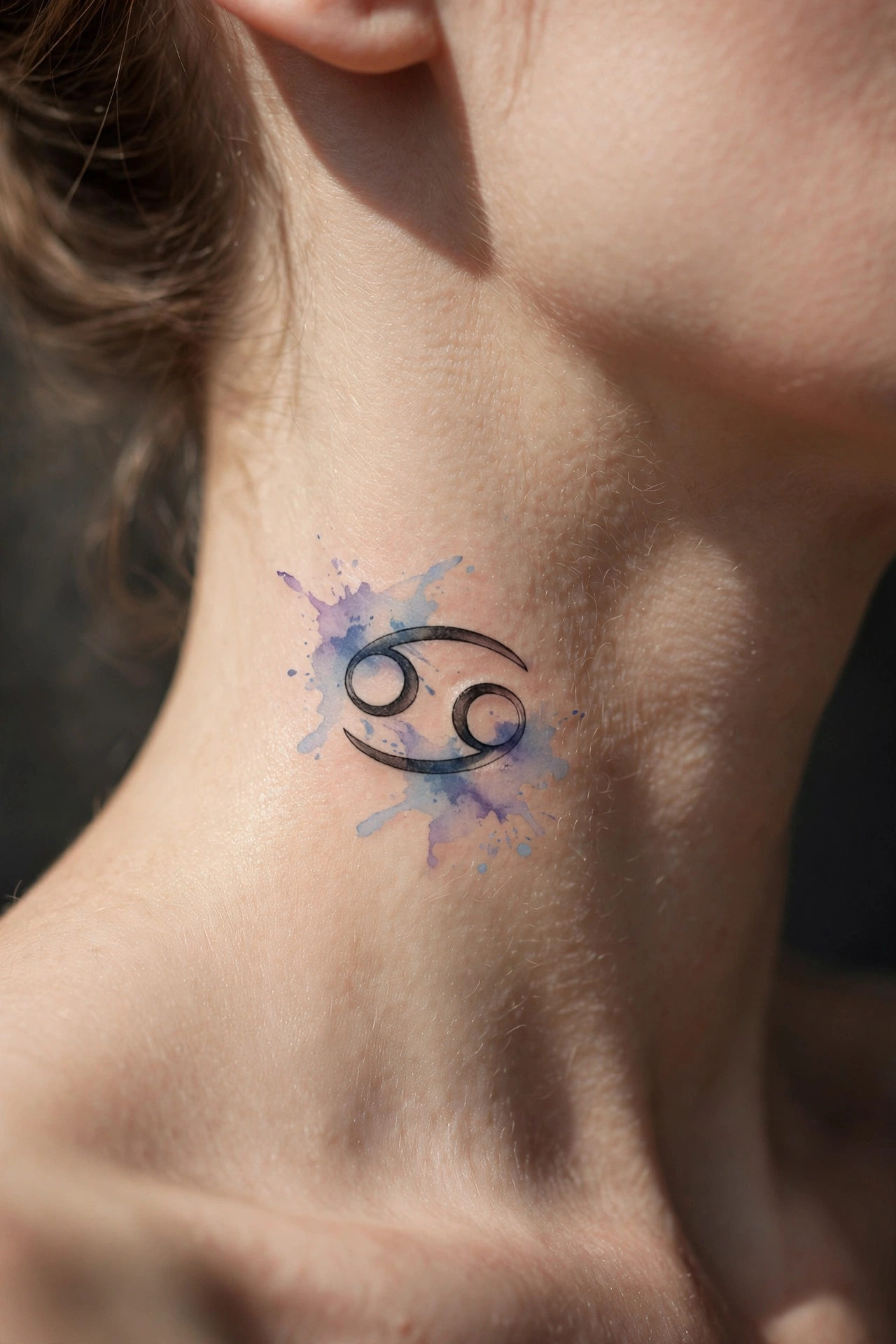 Zodiac sign glyph tattoo on the side of a neck
