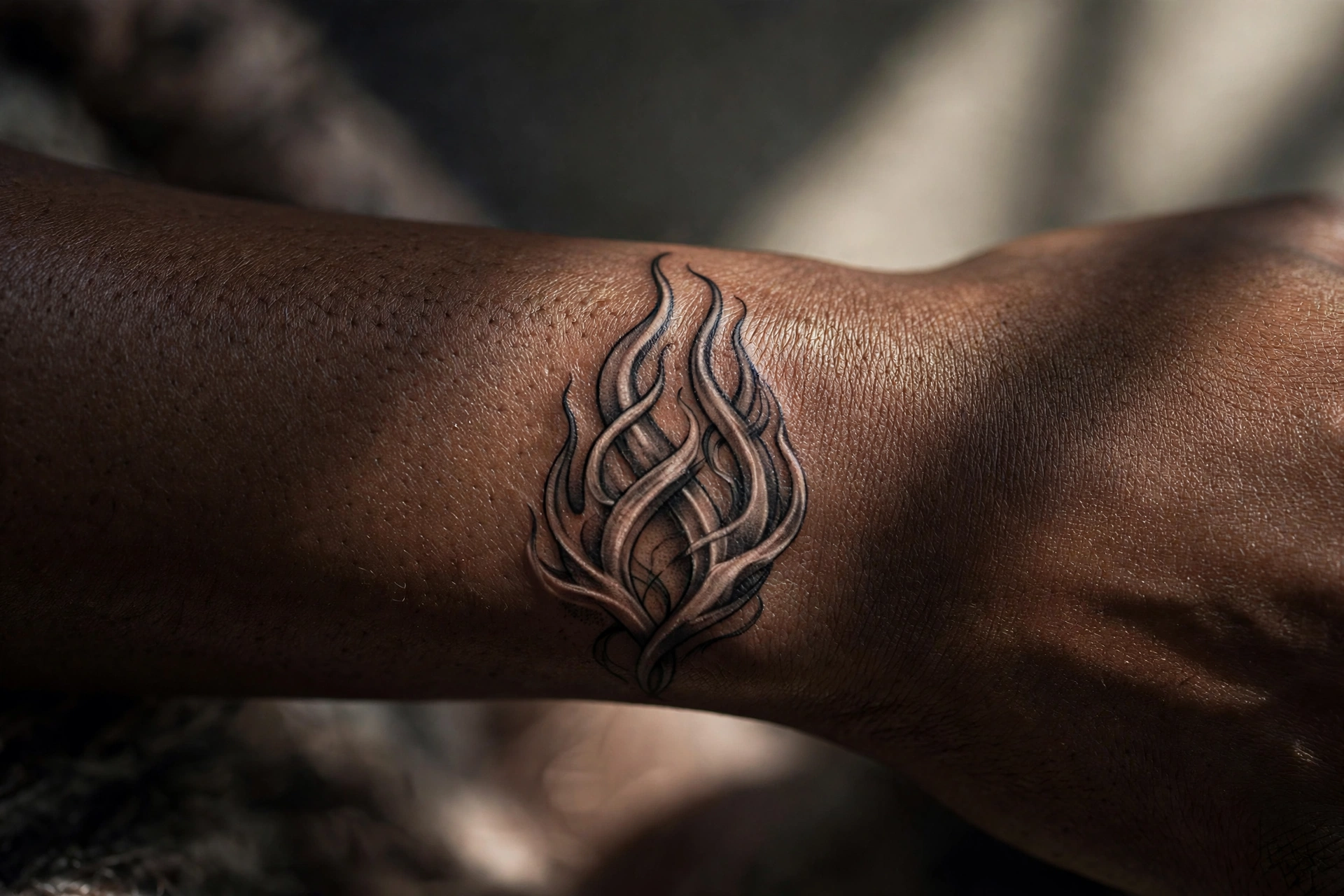 Twin flames tattoo with two intertwined fire shapes